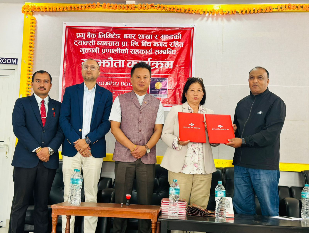 प्रभु बैंक र गण्डकी ट्याक्सी व्यवसायीबीच नगदरहित भुक्तानीमा सहकार्य गर्ने सम्झौता